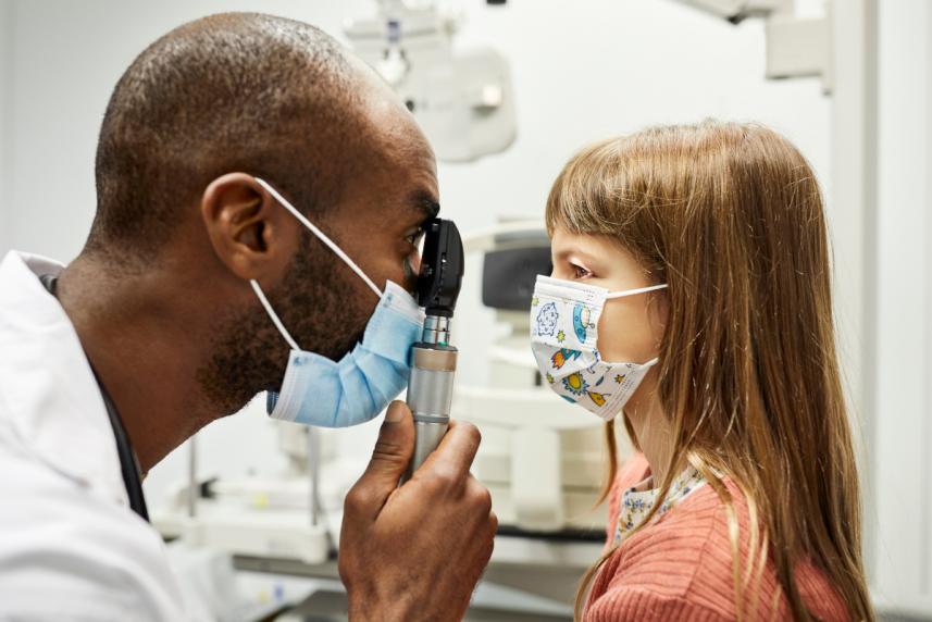 A child with a doctor for a routine checkup.jpg